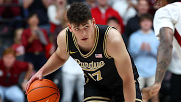 Purdue Boilermakers guard Omer Mayer (17) dribbles against Alabama Crimson Tide guard Labaron Philon (0) 
