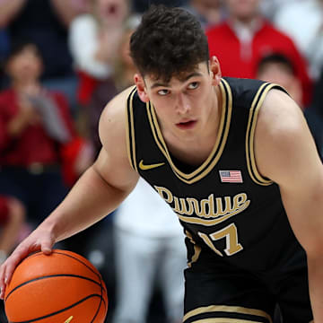 Purdue Boilermakers guard Omer Mayer (17) dribbles against Alabama Crimson Tide guard Labaron Philon (0) 