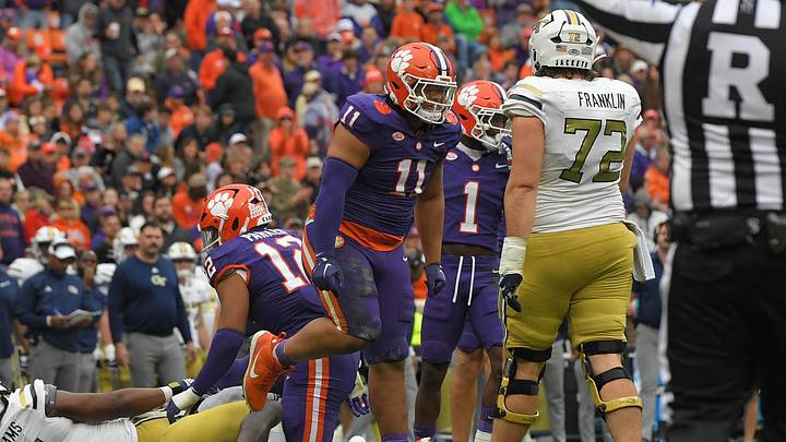 Nov 11, 2023; Clemson, South Carolina, USA; Clemson Tigers defensive lineman Peter Woods (11) reacts after tackling Georgia Tech Yellow Jackets quarterback Haynes King (10) during the third quarter at Memorial Stadium. Mandatory Credit: Ken Ruinard-Imagn Images