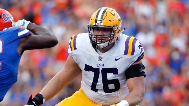 Oct 7, 2017; LSU Tigers offensive lineman Austin Deculus (76) blocks Florida Gators defensive lineman Jabari Zuniga (92)