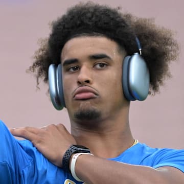 Sep 2, 2023; Pasadena, California, USA;   UCLA Bruins quarterback Dante Moore (3) warms up prior to the game against the Coastal Carolina Chanticleers at Rose Bowl. Mandatory Credit: Jayne Kamin-Oncea-Imagn Images