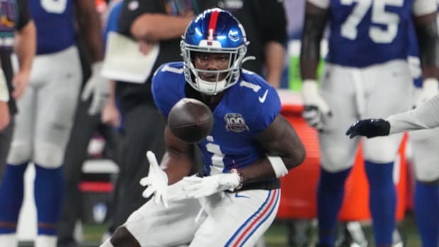 New York Giants wide receiver Malik Nabers (1) gathers in a pass