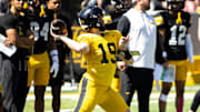 Apr 26, 2025; Iowa City, IA, USA; Iowa quarterback Jackson Stratton (19) throws during a spring NCAA football open practice at Kinnick Stadium. Mandatory Credit: Joseph Cress/For the Register