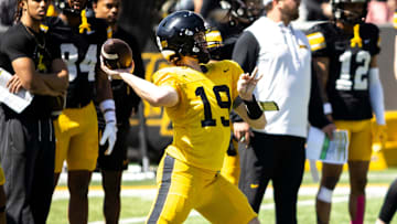 Apr 26, 2025; Iowa City, IA, USA; Iowa quarterback Jackson Stratton (19) throws during a spring NCAA football open practice at Kinnick Stadium. Mandatory Credit: Joseph Cress/For the Register