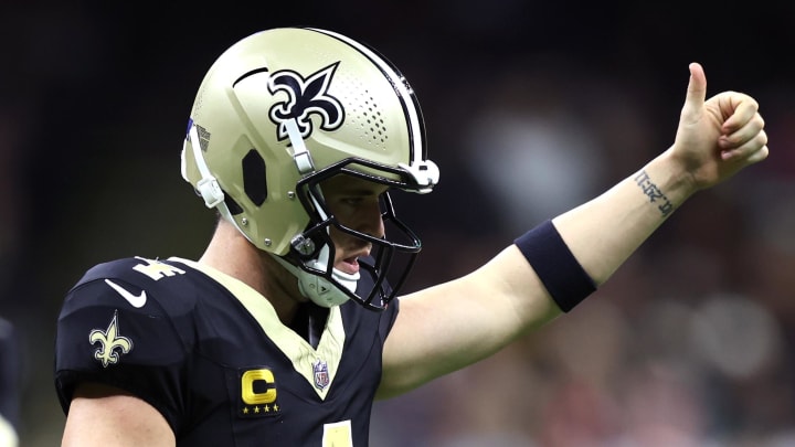Dec 17, 2023; New Orleans, Louisiana, USA; New Orleans Saints quarterback Derek Carr (4) gestures during the first half against the New York Giants at Caesars Superdome. Mandatory Credit: Stephen Lew-USA TODAY Sports