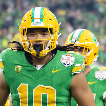 Jan 1, 2024; Glendale, AZ, USA; Oregon Ducks defensive end Matayo Uiagalelei (10) against the Liberty Flames during the 2024 Fiesta Bowl at State Farm Stadium. Mandatory Credit: Mark J. Rebilas-Imagn Images