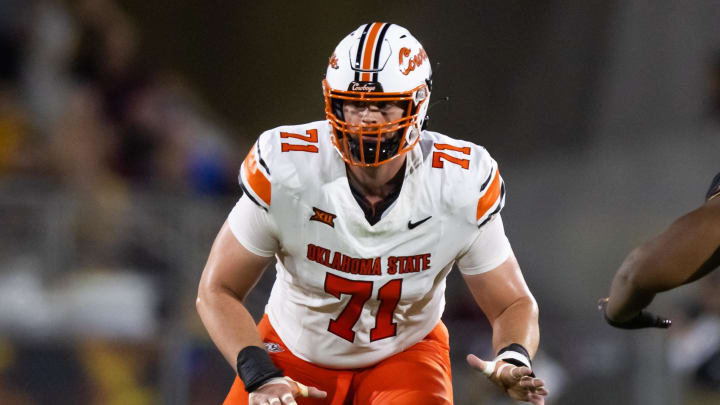 Sep 9, 2023; Tempe, Arizona, USA; Oklahoma State Cowboys offensive lineman Dalton Cooper (71) against the Arizona State Sun Devils at Mountain America Stadium. Mandatory Credit: Mark J. Rebilas-USA TODAY Sports