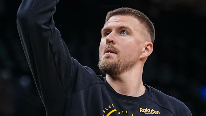Mar 18, 2026; Boston, Massachusetts, USA; Golden State Warriors center Kristaps Porzingis (7) warms up before the start of the game against the Boston Celtics at TD Garden. Mandatory Credit: David Butler II-Imagn Images