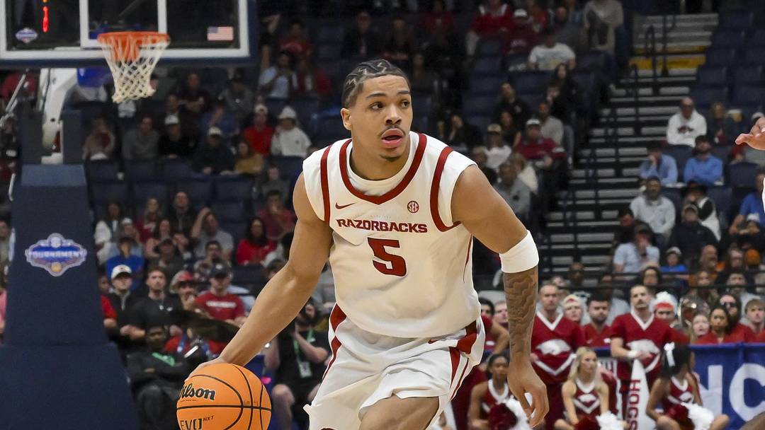 Mar 13, 2026; Nashville, TN, USA;  Arkansas Razorbacks guard Darius Acuff Jr. (5) drives to the basket against the Oklahoma Sooners during the first half at Bridgestone Arena. 