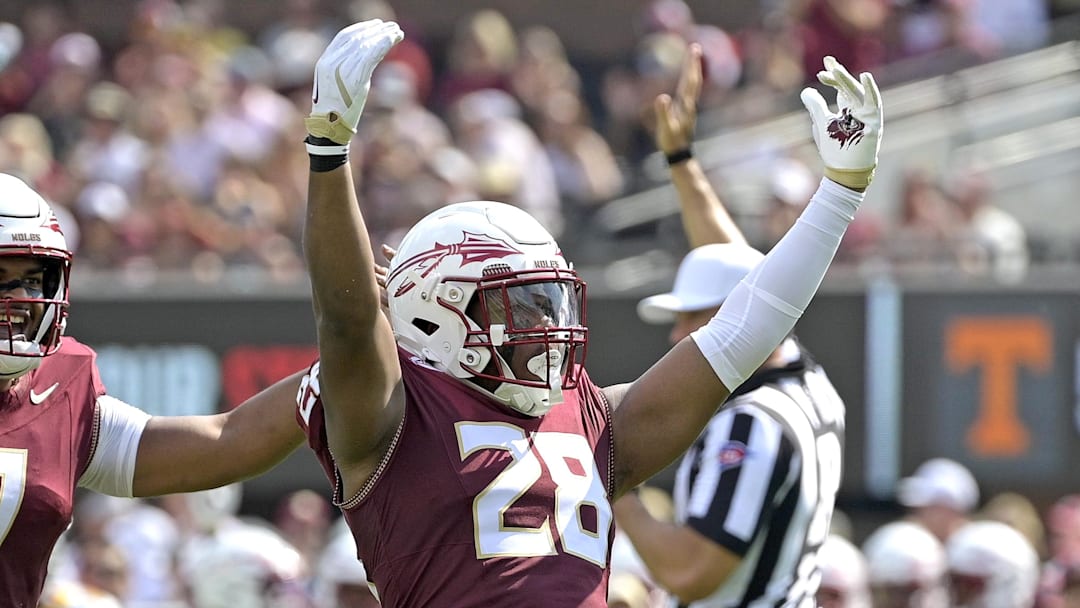 Sep 20, 2025; Tallahassee, Florida, USA; Florida State Seminoles linebacker Justin Cryer (28) celebrates a defensive stop during the first half against the Kent State Golden Flashes at Doak S. Campbell Stadium. Mandatory Credit: Melina Myers-Imagn Images