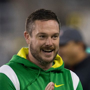 Oregon coach Dan Lanning joins his team during warmups before their game against Utah in final home game of season at Autzen Stadium.

Ncaa Football Oregon Utah Football Utah At Oregon
