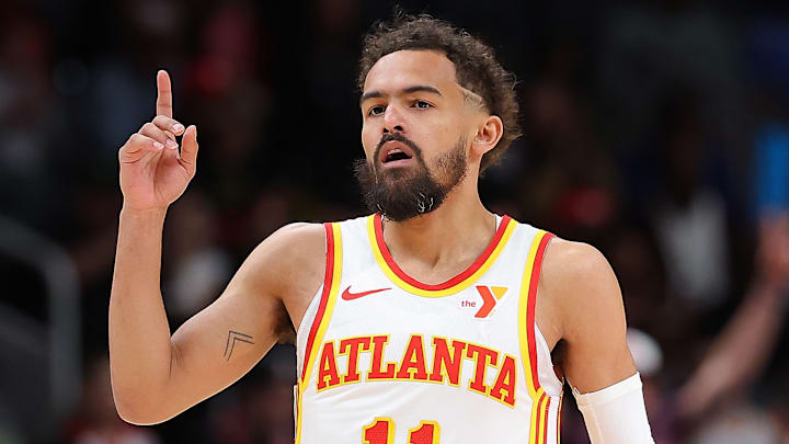 Trae Young #11 of the Atlanta Hawks reacts against the Portland Trail Blazers.