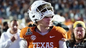 Dec 21, 2024; Austin, Texas, USA; Texas Longhorns quarterback Arch Manning (16) against the Clemson Tigers during the CFP National playoff first round at Darrell K Royal-Texas Memorial Stadium. Mandatory Credit: Mark J. Rebilas-Imagn Images