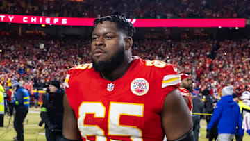 Jan 26, 2025; Kansas City, MO, USA; Kansas City Chiefs guard Trey Smith (65) against the Buffalo Bills in the AFC Championship game at GEHA Field at Arrowhead Stadium. Mandatory Credit: Mark J. Rebilas-Imagn Images