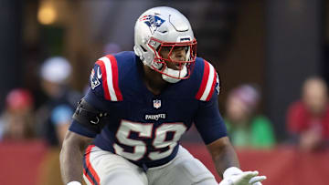 Dec 15, 2024; Glendale, Arizona, USA; New England Patriots offensive tackle Vederian Lowe (59) against the Arizona Cardinals at State Farm Stadium. Mandatory Credit: Mark J. Rebilas-Imagn Images