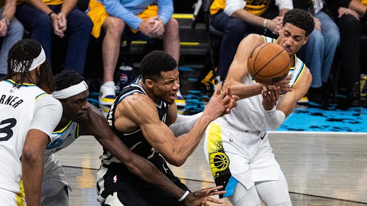 Apr 29, 2025; Indianapolis, Indiana, USA; Indiana Pacers guard Tyrese Haliburton (0) steals the ball from Milwaukee Bucks forward Giannis Antetokounmpo (34) during game five of the first round for the 2024 NBA Playoffs at Gainbridge Fieldhouse. Mandatory Credit: Trevor Ruszkowski-Imagn Images Apr 29, 2025; Indianapolis, Indiana, USA; Indiana Pacers guard Tyrese Haliburton (0) steals the ball from Milwaukee Bucks forward Giannis Antetokounmpo (34) during game five of the first round for the 2024 NBA Playoffs at Gainbridge Fieldhouse. Mandatory Credit: Trevor Ruszkowski-Imagn Images