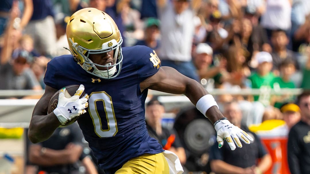 Sep 20, 2025; South Bend, Indiana, USA; Notre Dame Fighting Irish wide receiver Malachi Fields (0) runs after making a catch at Notre Dame Stadium. Mandatory Credit: Michael Caterina-Imagn Images