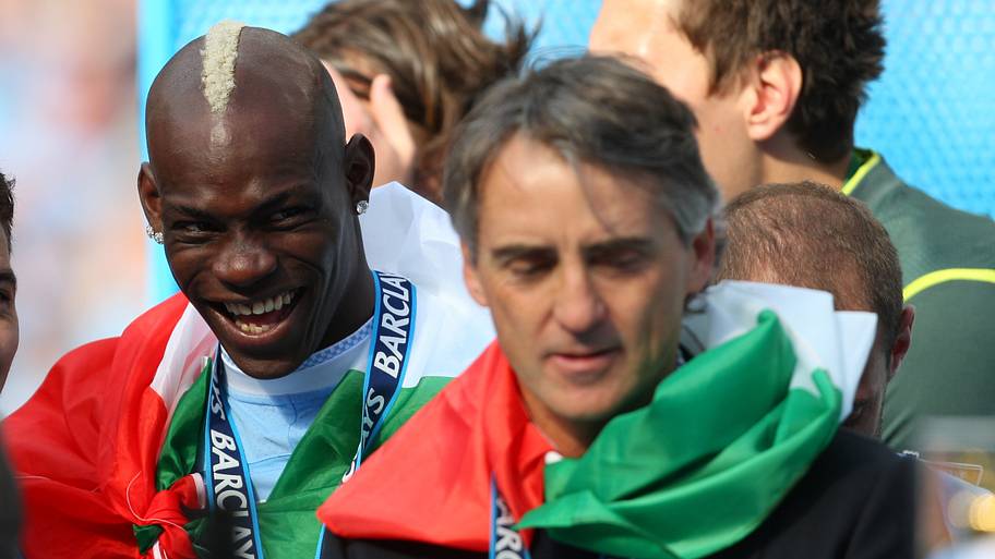 Mario Balotelli laughing.