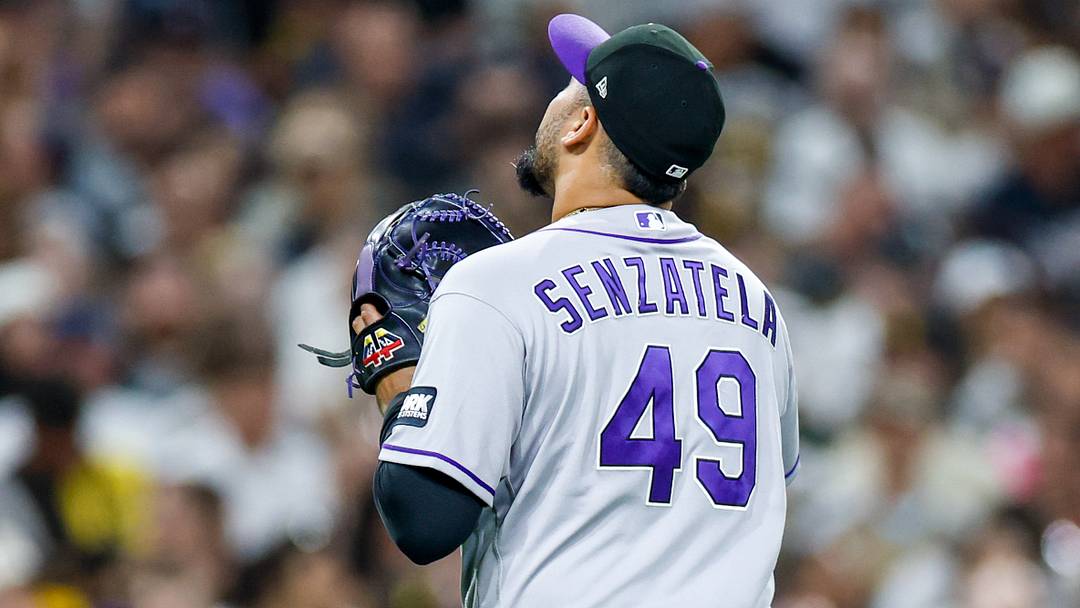Colorado Rockies relief pitcher Antonio Senzatela (49) celebrates walking off the field Colorado Rockies relief pitcher Antonio Senzatela (49) celebrates walking off the field