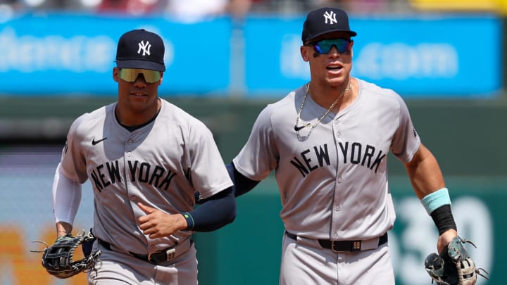 Jul 31, 2024; Philadelphia, Pennsylvania, USA;  New York Yankees outfielder Aaron Judge (R) and outfielder Juan Soto (L) run from the outfield.