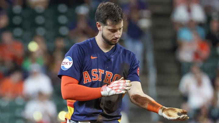 May 15, 2024; Houston, Texas, USA; Houston Astros right fielder Kyle Tucker (30) wipes off his uniform after hitting a double against the Oakland Athletics in the first inning at Minute Maid Park