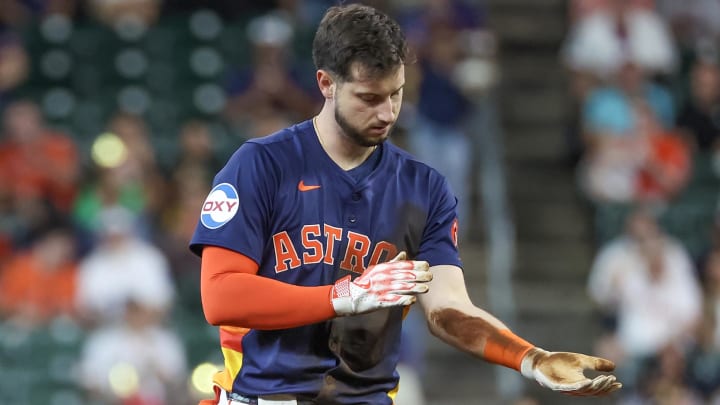 May 15, 2024; Houston, Texas, USA; Houston Astros right fielder Kyle Tucker (30) wipes off his uniform after hitting a double against the Oakland Athletics in the first inning at Minute Maid Park.