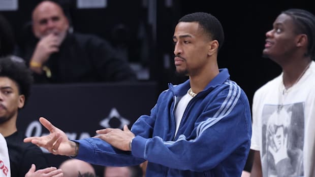 Utah's jazz striker John Collins reacts to a piece of the bench