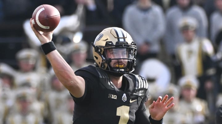 Purdue Boilermakers quarterback Hudson Card (1) throws a pass 