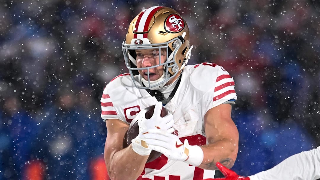 Dec 1, 2024; Orchard Park, New York, USA; San Francisco 49ers running back Christian McCaffrey (23) carries the ball against the Buffalo Bills in the second quarter at Highmark Stadium. Mandatory Credit: Mark Konezny-Imagn Images