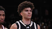 Apr 1, 2025; Brooklyn, NY, USA; McDonald's All American West guard Darryn Peterson (22) and McDonald's All American East forward Cameron Boozer (12) pose for photos after the game at Barclays Center. Mandatory Credit: Pamela Smith-Imagn Images