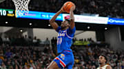 Feb 1, 2025; Waco, Texas, USA;  Kansas Jayhawks forward Flory Bidunga (40) dunks the ball against the Baylor Bears during the first half at Paul and Alejandra Foster Pavilion. Mandatory Credit: Chris Jones-Imagn Images