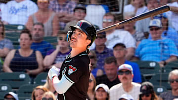 Arizona Diamondbacks' Corbin Carroll hits a single to left field against the Kansas City Royals in the first inning during a spring training game at Salt River Fields at Talking Stick on Feb. 28, 2025, in Scottsdale.