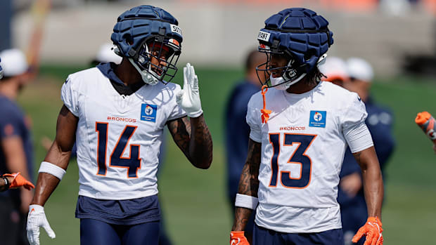 Denver Broncos wide receiver Courtland Sutton (14) and wide receiver Pat Bryant (13) during Denver Broncos Training Camp.
