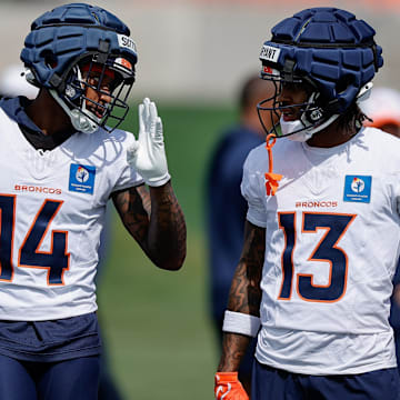 Jul 24, 2025; Englewood, CO, USA; Denver Broncos wide receiver Courtland Sutton (14) and wide receiver Pat Bryant (13) during Denver Broncos Training Camp. 