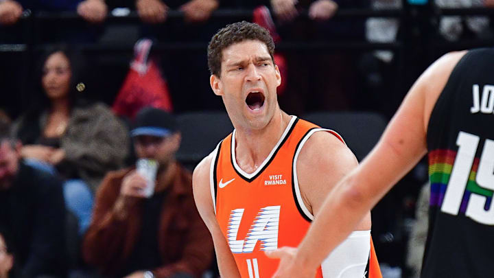 Los Angeles Clippers center Brook Lopez reacts after being charged with a foul against Denver Nuggets center Nikola Jokic during the first half at Intuit Dome on November 12.