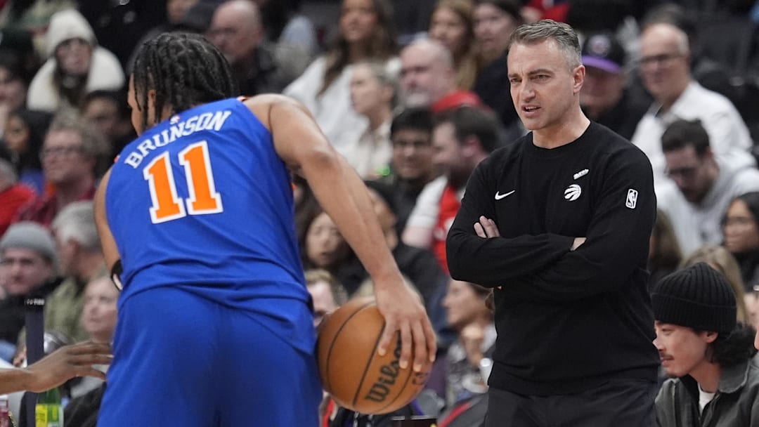 Jan 28, 2026; Toronto, Ontario, CAN; Toronto Raptors head coach Darko Rajakovic watches as New York Knicks guard Jalen Brunson (11) looks to make a play during the second half at Scotiabank Arena. Mandatory Credit: John E. Sokolowski-Imagn Images Jan 28, 2026; Toronto, Ontario, CAN; Toronto Raptors head coach Darko Rajakovic watches as New York Knicks guard Jalen Brunson (11) looks to make a play during the second half at Scotiabank Arena. Mandatory Credit: John E. Sokolowski-Imagn Images