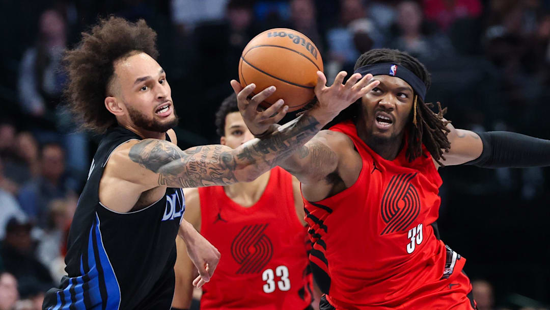 Nov 16, 2025; Dallas, Texas, USA; Portland Trail Blazers center Robert Williams III (35) and Dallas Mavericks center Dereck Lively II (2) battle for the ball during the second half at American Airlines Center. Mandatory Credit: Kevin Jairaj-Imagn Images Nov 16, 2025; Dallas, Texas, USA; Portland Trail Blazers center Robert Williams III (35) and Dallas Mavericks center Dereck Lively II (2) battle for the ball during the second half at American Airlines Center. Mandatory Credit: Kevin Jairaj-Imagn Images