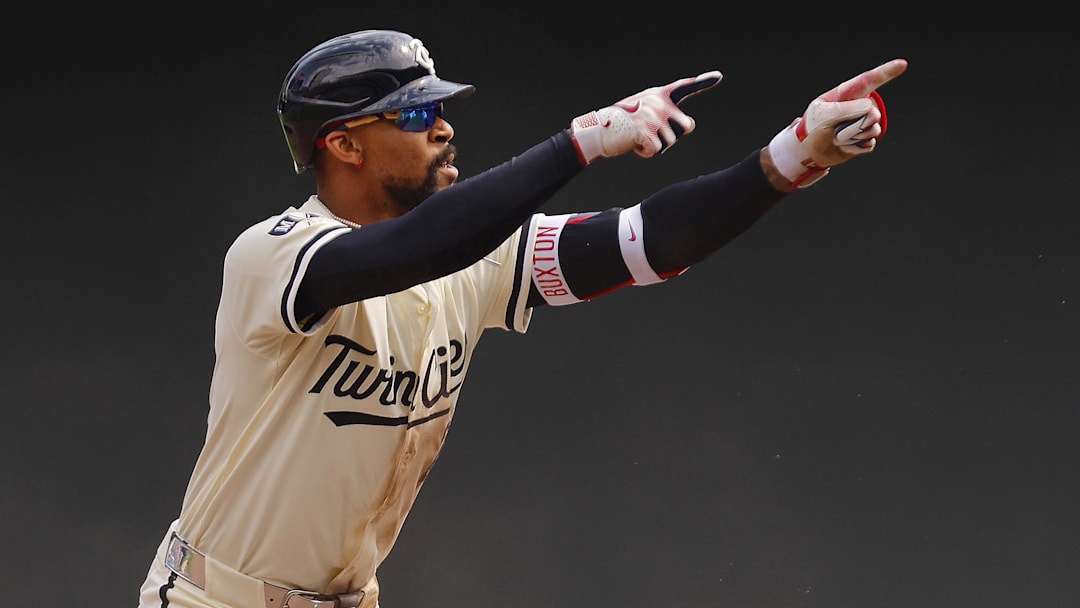Apr 13, 2025; Minneapolis, Minnesota, USA; Minnesota Twins center fielder Byron Buxton (25) celebrates his double against the Detroit Tigers in the sixth inning at Target Field. Mandatory Credit: Bruce Kluckhohn-Imagn Images