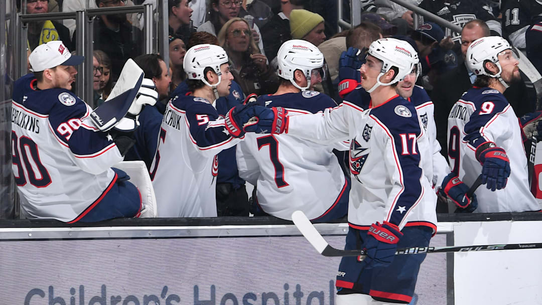 Blue Jackets winger Mason Marchment celebrates a goal with his teammates. 