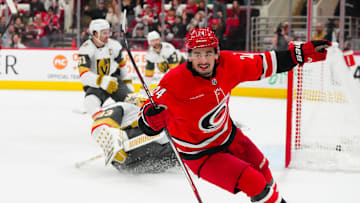 Jan 17, 2025; Raleigh, North Carolina, USA; Carolina Hurricanes center Seth Jarvis (24) scores a goal against the Vegas Golden Knights during the third period at Lenovo Center. Mandatory Credit: James Guillory-Imagn Images