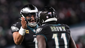 Nov 28, 2025; Philadelphia, Pennsylvania, USA; Philadelphia Eagles quarterback Jalen Hurts (1) and wide receiver A.J. Brown (11) celebrate a touchdown against the Chicago Bears during the third quarter of the game at Lincoln Financial Field. Mandatory Credit: Bill Streicher-Imagn Images