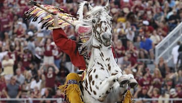 Oct 26, 2019; Tallahassee, FL, USA; Florida State Seminoles mascots Chief Osceola rides Renegade during the third quarter as Florida State hosts Syracuse at Doak Campbell Stadium. Mandatory Credit: Glenn Beil-Imagn Images
