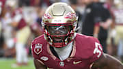 Oct 4, 2025; Tallahassee, Florida, USA; Florida State Seminoles defensive back Christian White (37) warms up before a game against the Miami Hurricanes at Doak S. Campbell Stadium. Mandatory Credit: Robert Myers-Imagn Images