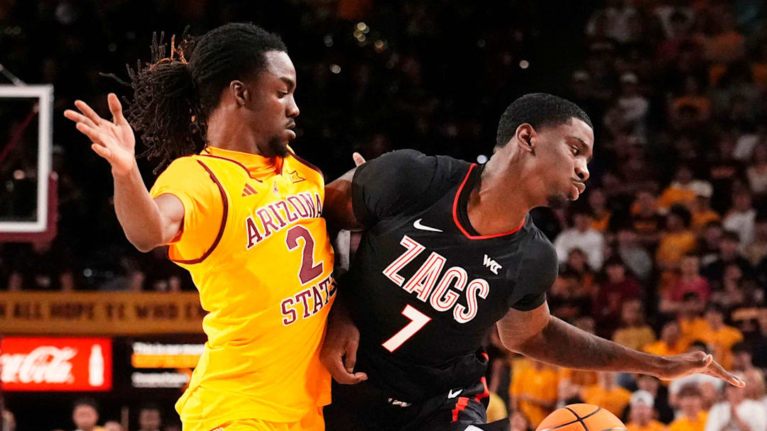 Arizona State Sun Devils guard Anthony Johnson (2) leans into Gonzaga Bulldogs guard Tyon Grant-Foster (7) on Nov. 14, 2025, at Desert Financial Arena in Tempe.