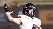 Nov 1, 2025; Berkeley, California, USA; Virginia Cavaliers quarterback Chandler Morris (4) throws a pass during warmups before the game against the California Golden Bears at California Memorial Stadium. Mandatory Credit: D. Ross Cameron-Imagn Images