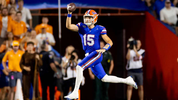 Florida Gators quarterback Graham Mertz attempts a pass during a college football game in the SEC.
