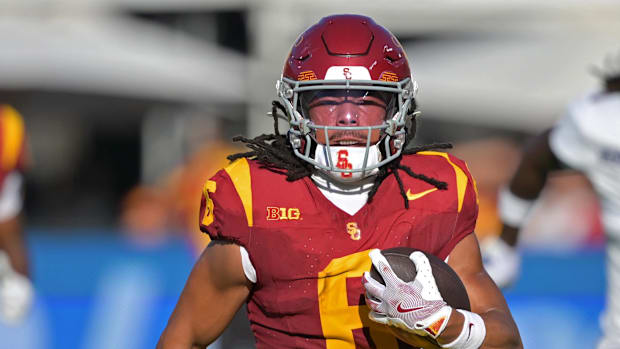 USC Trojans wide receiver Makai Lemon (6) runs down the field