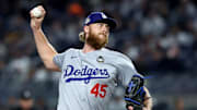 Los Angeles Dodgers pitcher Michael Kopech (45) throws during the ninth inning against the New York Yankees in game three of the 2024 MLB World Series at Yankee Stadium.