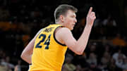 Iowa Hawkeyes forward Pryce Sandfort (24) reacts after making a 3 against the Washington Huskies Saturday, Feb. 22, 2025 at Carver-Hawkeye Arena in Iowa City, Iowa.