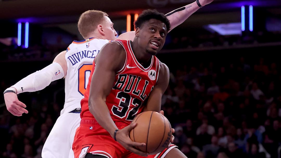 Jan 3, 2024; New York, New York, USA; Chicago Bulls forward Terry Taylor (32) drives to the basket against New York Knicks guard Donte DiVincenzo (0) during the third quarter at Madison Square Garden. Mandatory Credit: Brad Penner-Imagn Images